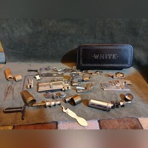 White Vintage Sewing Machine Attachments Set